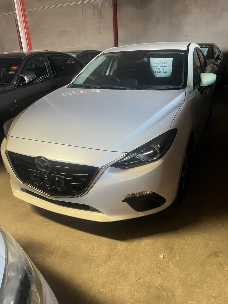 2015 Mazda Axela, white — photo 1 of 4