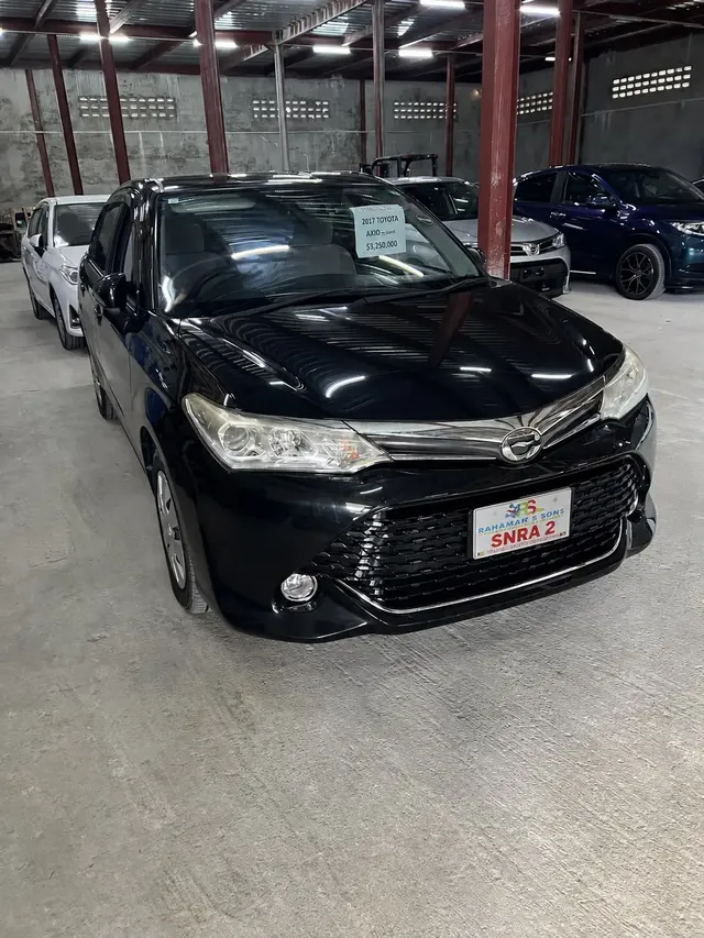 2017 Toyota Corolla Axio, black sedan for sale at Rahaman & Sons, Success — sold