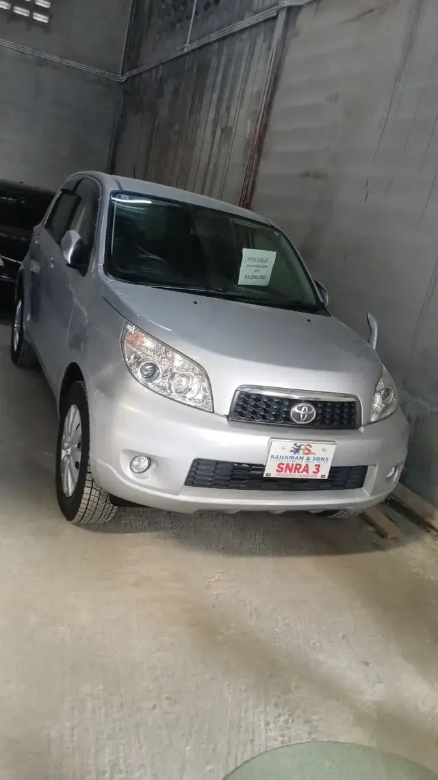 2013 Toyota Rush, silver suv for sale at Rahaman & Sons, Success — sold