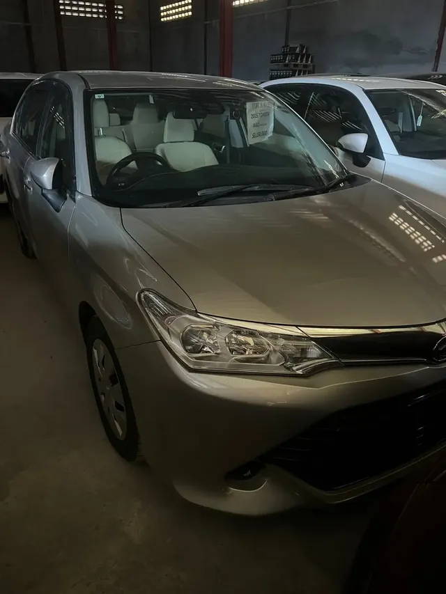 2015 Toyota Corolla Axio, silver sedan for sale at Rahaman & Sons, Success — in stock