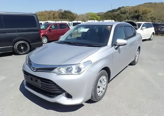 2016 Toyota Corolla Axio, white sedan for sale at Rahaman & Sons, Success — arriving soon