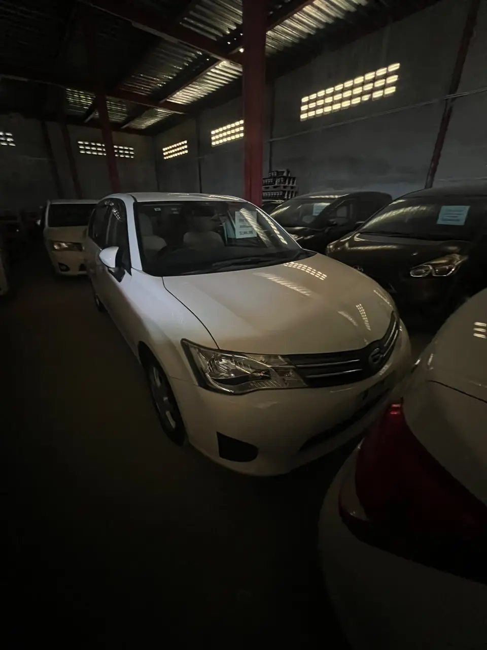 2014 Toyota Corolla Axio, white — photo 1 of 4